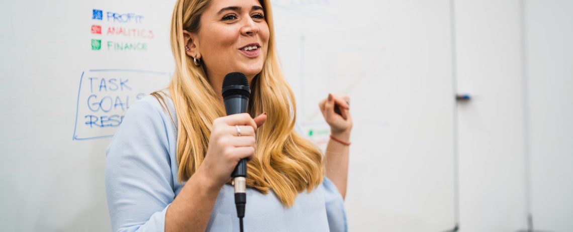 business woman explaining plan of work in conference.